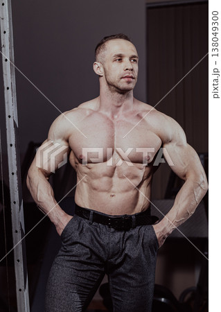 Bodybuilder posing in the gym, aesthetic body 138049300