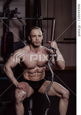 Bodybuilder posing in the gym, aesthetic body 138049306