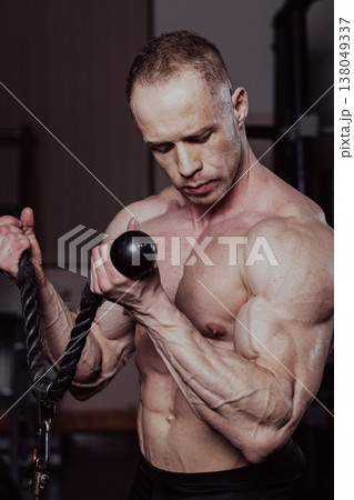 Bodybuilder training in the gym, aesthetic body 138049337