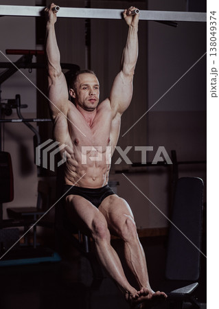 Bodybuilder training in the gym, aesthetic body 138049374