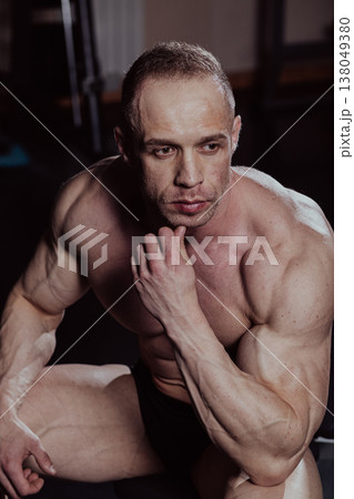 Bodybuilder posing in the gym, aesthetic body 138049380