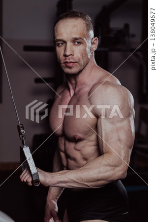 Bodybuilder training in the gym, aesthetic body Bodybuilder training in the gym, aesthetic body 138049677
