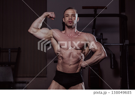 Bodybuilder posing in the gym, aesthetic body Bodybuilder posing in the gym, aesthetic body 138049685