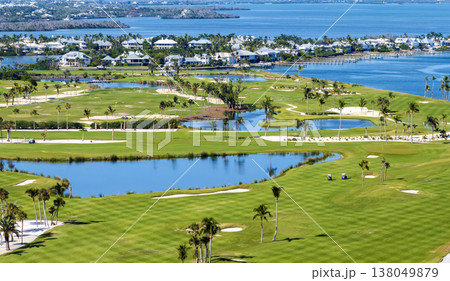 Waterfront golf course in Florida. Sports grounds with green grass in Boca Grande, small town on Gasparilla Island Waterfront golf course in Florida. Sports grounds with green grass in Boca Grande, small town on Gasparilla Island 138049879
