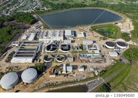 Water treatment facility is essential infrastructure to clean and process water, removing pollutants before distributing it to homes and businesses Water treatment facility is essential infrastructure to clean and process water, removing pollutants before distributing it to homes and businesses 138049880
