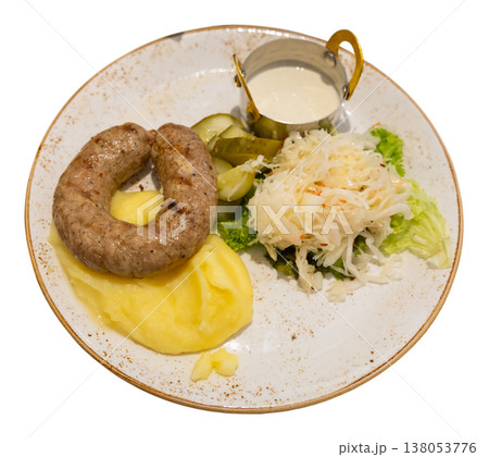 Pork sausages with mashed potatoes, horseradish sauce and cucumbers Pork sausages with mashed potatoes, horseradish sauce and cucumbers 138053776
