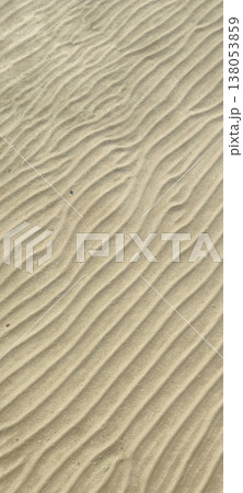 The ribbed texture of sand on the bottom or shore of a body of water The ribbed texture of sand on the bottom or shore of a body of water 138053859