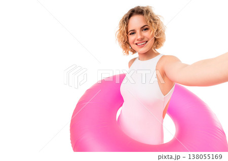 Girl smiles while holding a pink float at the beach, PNG Girl smiles while holding a pink float at the beach, PNG 138055169