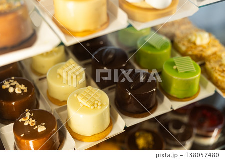 Mousse and mini cakes on display 138057480