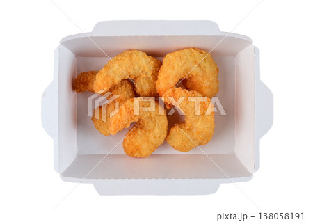 Crispy fried shrimp in white paper take out box on white background top view close up flat lay with copy space delicious seafood snack 138058191