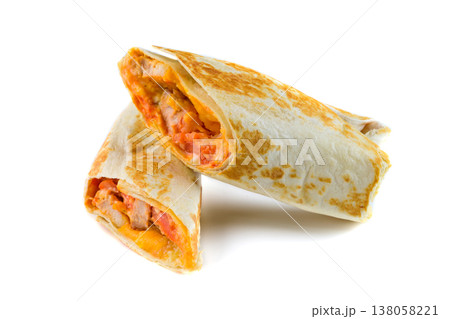 Freshly grilled chicken wrap cut in half with melted cheese and tomato on white background side view close up delicious savory meat snack for menu 138058221