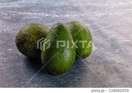 Raw ripe green juicy avocado Raw ripe green juicy avocado 138062059