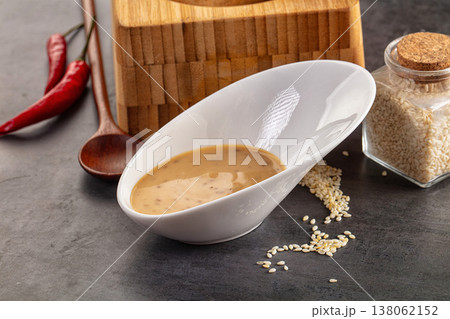 Asian sesame sauce with seeds Asian sesame sauce with seeds 138062152