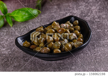 Canned marinated capers buds heap 138062198