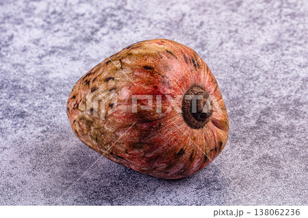 Exotic cherimoya fruit on a wooden table background Exotic cherimoya fruit on a wooden table background 138062236
