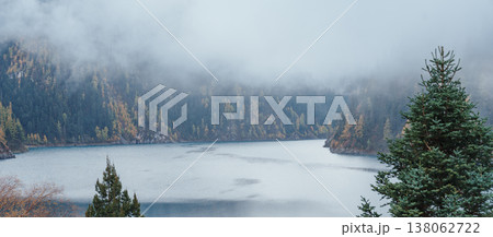 Scenery Jiuzhaigou national park in Sichuan, China. Beautiful Long lake and snow mountain in Autumn season. Famous Landmark and Vacation near Chengdu, China. Asia travel concept Scenery Jiuzhaigou national park in Sichuan, China. Beautiful Long lake and snow mountain in Autumn season. Famous Landmark and Vacation near Chengdu, China. Asia travel concept 138062722