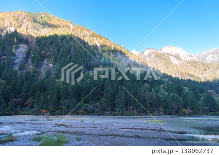 Scenery Jiuzhaigou national park in Sichuan, China. Beautiful of Arrow Bamboo Lake and snow mountain in Autumn season. Famous Landmark and Vacation near Chengdu, China. Asia travel concept 138062737