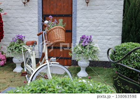 March 21 2026 Blooming in a Cottage Garden With Vintage Bicycle and Colorful March 21 2026 Blooming in a Cottage Garden With Vintage Bicycle and Colorful 138063598