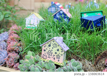 March 21 2026 Hand Painted Mini Houses Nestled Among Grass and Succulents March 21 2026 Hand Painted Mini Houses Nestled Among Grass and Succulents 138063614