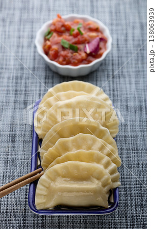 Boiled Dumplings with Fresh Tomato Salsa and Chopsticks Boiled Dumplings with Fresh Tomato Salsa and Chopsticks 138063939