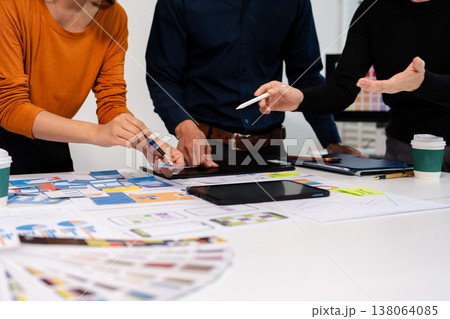 UX developer and ui designer brainstorming about mobile app interface wireframe design with customer breif and color code, User experience concept. UX developer and ui designer brainstorming about mobile app interface wireframe design with customer breif and color code, User experience concept. 138064085