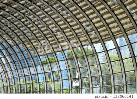 Glass canopy showcasing repeating geometric frames and day light 138066141