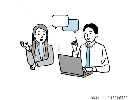 パソコンを操作しながら会話する若いビジネスマン 138066532