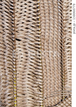 woven mats of dried coconut leaves woven mats of dried coconut leaves 138068778