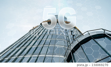 5G internet technology displayed on a tall building in an urban area during daylight 5G internet technology displayed on a tall building in an urban area during daylight 138069270