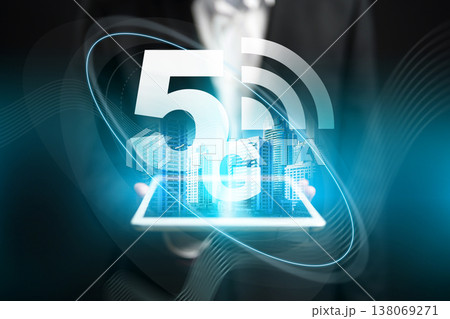 5G internet technology is presented on a tablet with a city skyline in the background 138069271