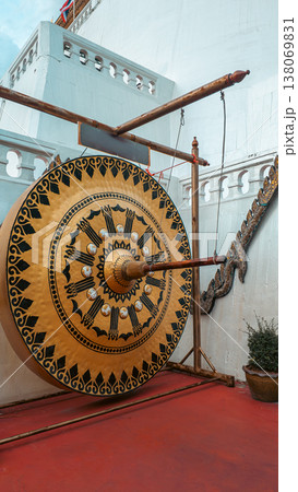 golden gong with mallet in Wat Saket Buddhist temple, Ritual Thai gong 138069831