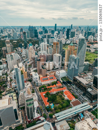 modern Bangkok city with skyscrapers of financial downtown district aerial view, drone view of bustling capital of Thailand modern Bangkok city with skyscrapers of financial downtown district aerial view, drone view of bustling capital of Thailand 138069837