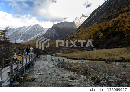 Yading Nature Reserve : Xiannairi and Pearl Sea Autumn Scenery in Daocheng Yading Scenic Area Sichuan Province China. Yading Nature Reserve : Xiannairi and Pearl Sea Autumn Scenery in Daocheng Yading Scenic Area Sichuan Province China. 138069937