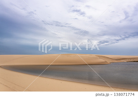 Dunes and lagoons of Atins, Lencois Maranhenses, Barreirinhas, Brazil. White sand dunes with pools of fresh water Dunes and lagoons of Atins, Lencois Maranhenses, Barreirinhas, Brazil. White sand dunes with pools of fresh water 138071774