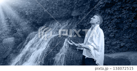 Young guy at old waterfall 138072515