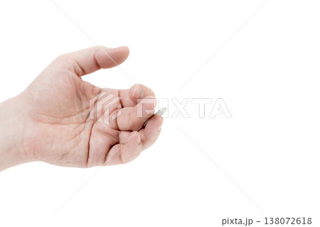 A man's hand is juggling a coin. A man's hand is juggling a coin. 138072618