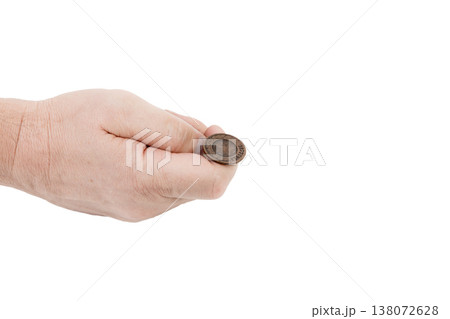 A man's hand holding coins. 138072628