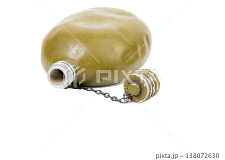An old, time-worn soldier's flask. An old, time-worn soldier's flask. 138072630
