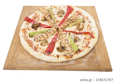 Vegetable pizza on a wooden tray. Vegetable pizza on a wooden tray. 138072767