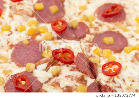Pepperoni pizza with corn on a wooden tray. 138072774