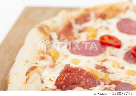 Pepperoni pizza with corn on a wooden tray. 138072775