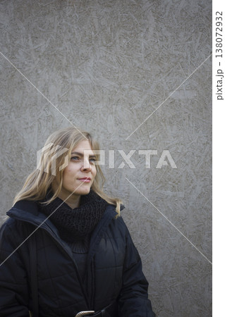 A young woman walks through the autumn park. 138072932