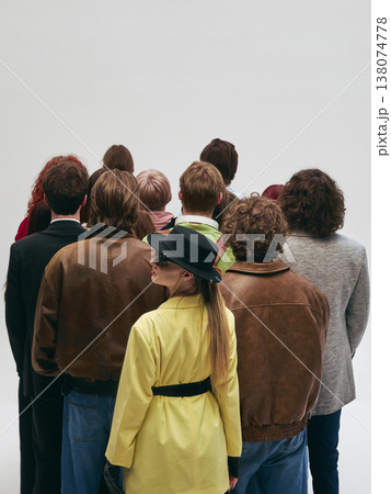 Crowd of people standing tightly together from behind in minimal studio space. Crowd of people standing tightly together from behind in minimal studio space. 138074778