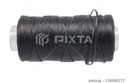 spool of colored thread on a white isolated background 138080277