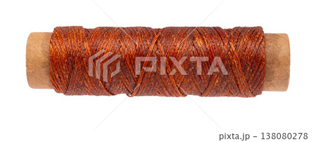 spool of colored thread on a white isolated background 138080278