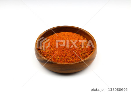 Cajun seasoning in a wooden bowl isolated on white background 138080693