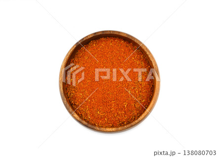 Cajun seasoning in a wooden bowl isolated on white background Cajun seasoning in a wooden bowl isolated on white background 138080703