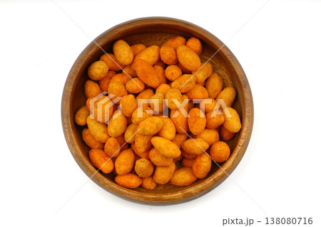 Crunchy Coated Peanuts in a White Bowl Isolated on White Background Crunchy Coated Peanuts in a White Bowl Isolated on White Background 138080716