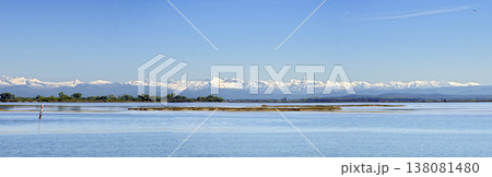 lagoon of Grado with snowcovered alps lagoon of Grado with snowcovered alps 138081480