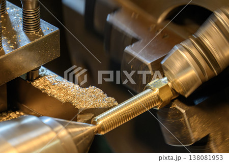 Precision thread making process on a brass material shaft part using a CNC lathe machine. Precision thread making process on a brass material shaft part using a CNC lathe machine. 138081953